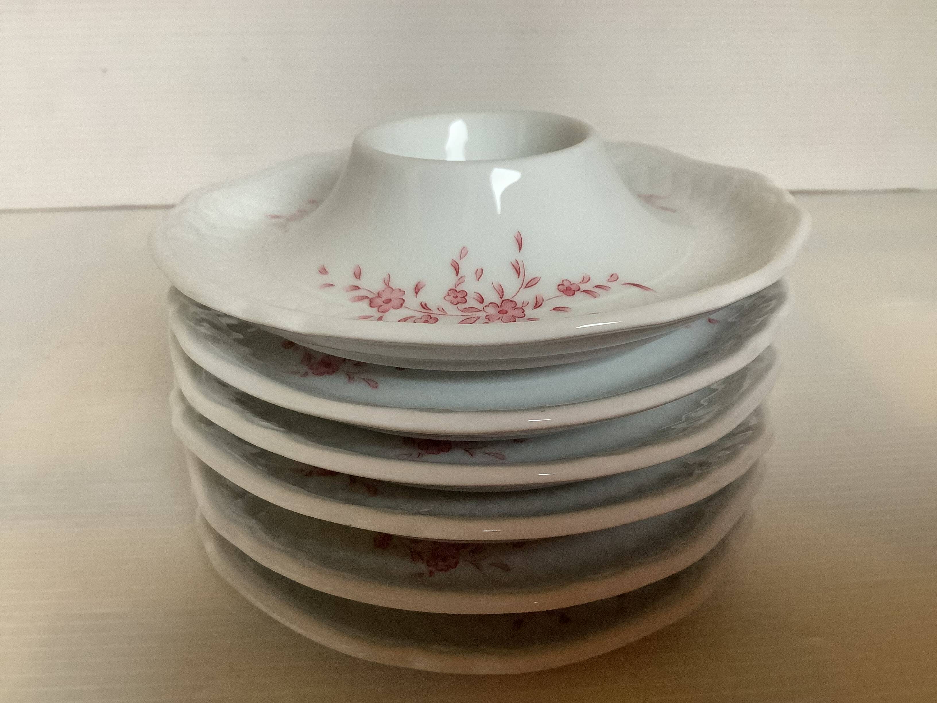 Six egg cups with toile de Jouy flowers