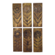 Six cleanliness plaques, flower design, brass.