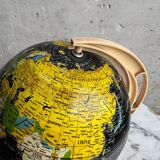 French mid-century school globe with black oceans on printed paper, cream plastic base