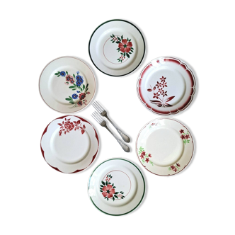 Old mismatched earthenware dinner plates