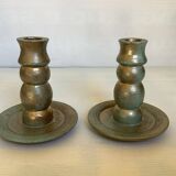 Pair of green and gold wooden candlesticks