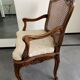 Regency canned armchair in carved walnut