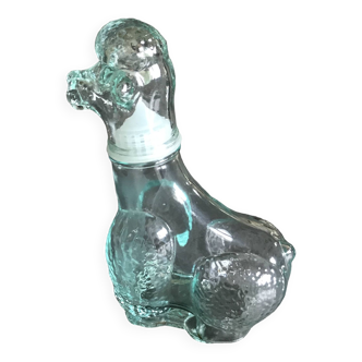 Bottle poodle dog bottle in empolied glass, italy