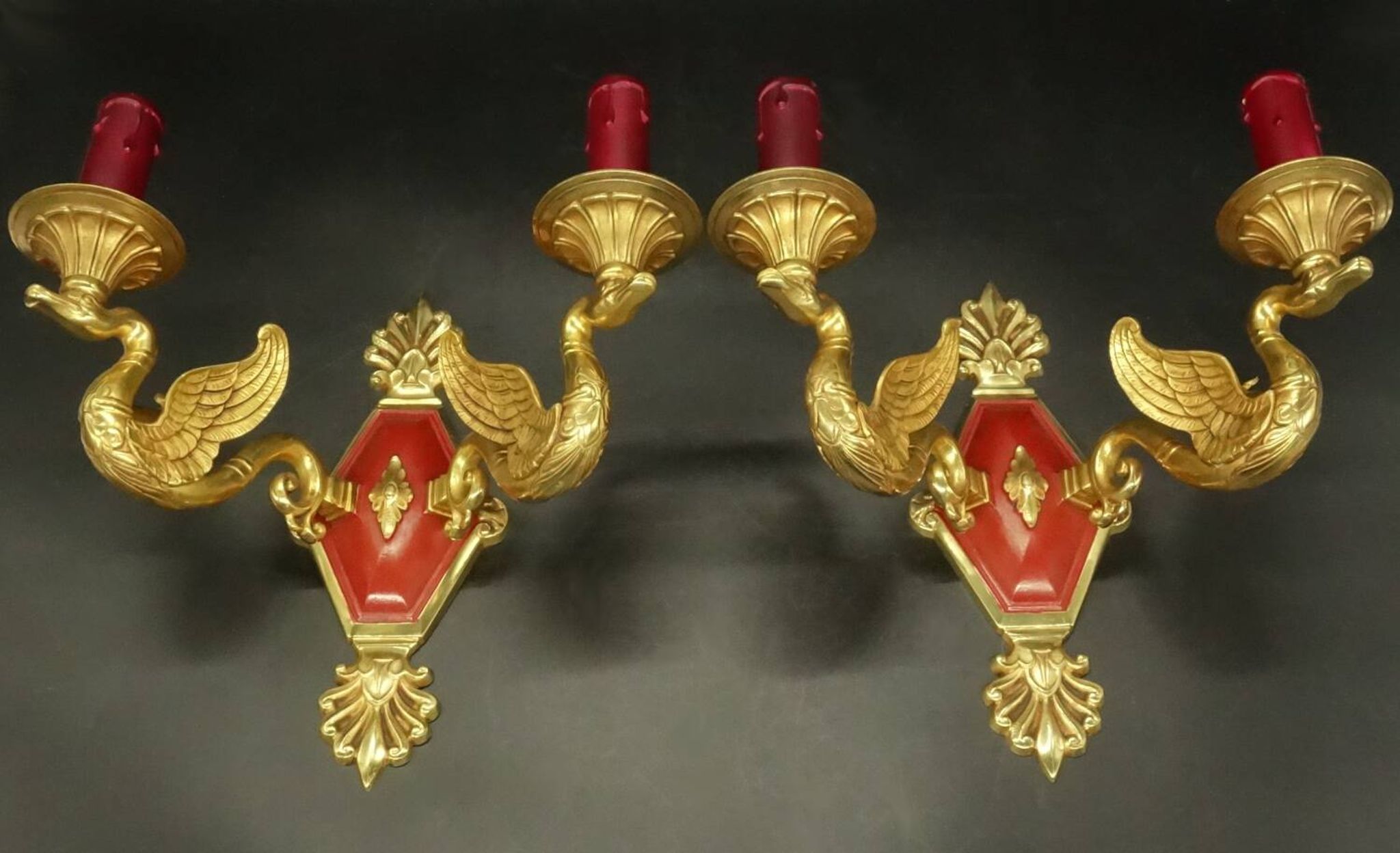 Pair of Empire style wall sconces with swans from Petitot - bronze & bordeaux patina.