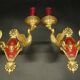 Paire d'appliques aux cygnes style Empire de chez Petitot - bronze & patine bordeaux