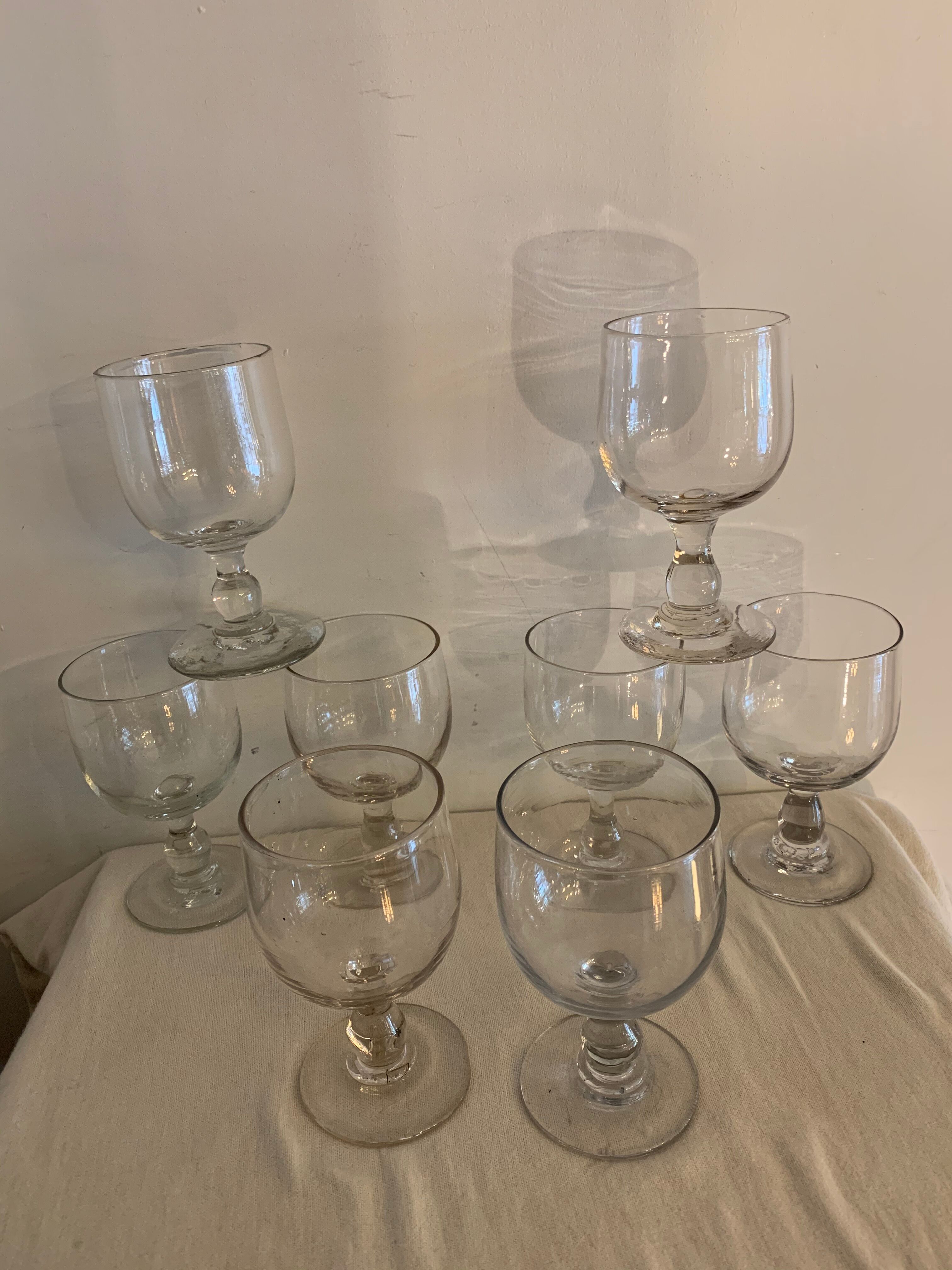 8 old red wine glasses with blown and bubbled glass walk