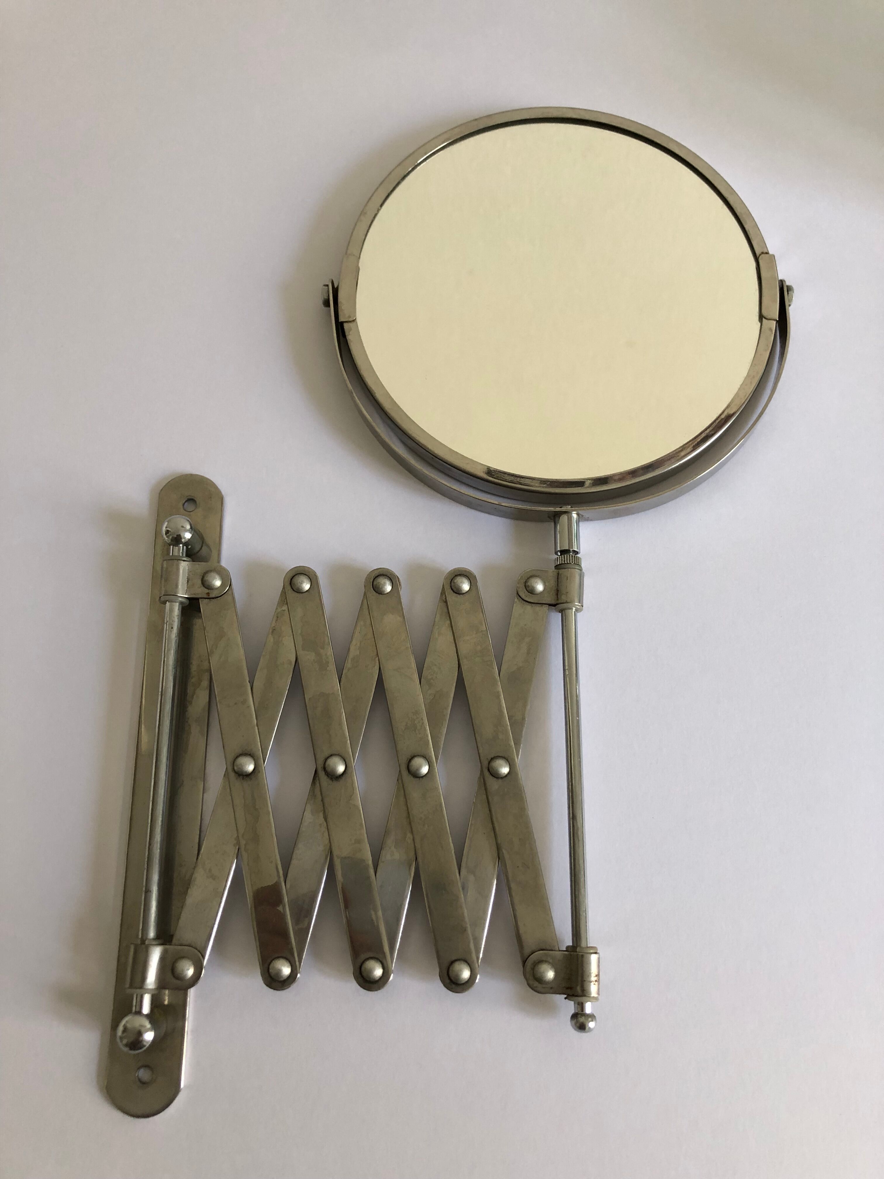 Extendable wall mirror