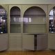 Showcases in lacquered wood, glass and brass  1970s, set of 4