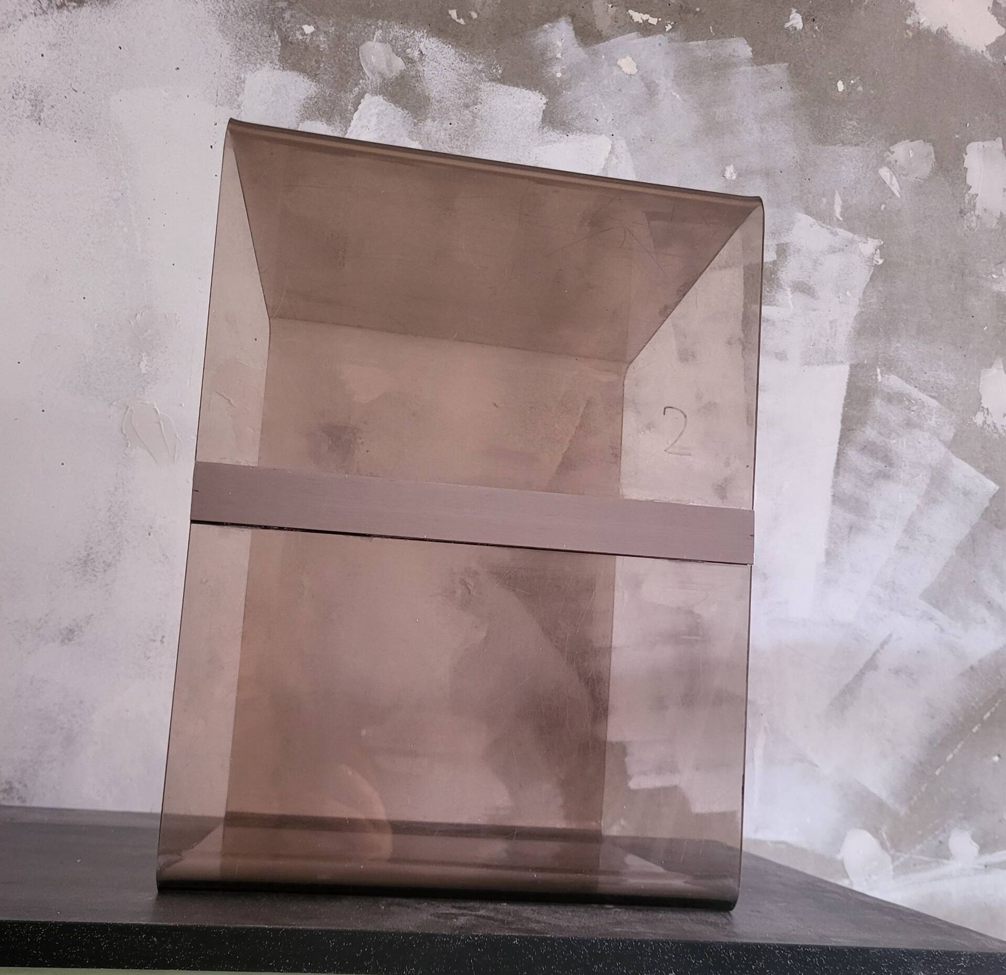 Rectangular piece of furniture or smoked plexiglass coffee table by Michel Dumas.