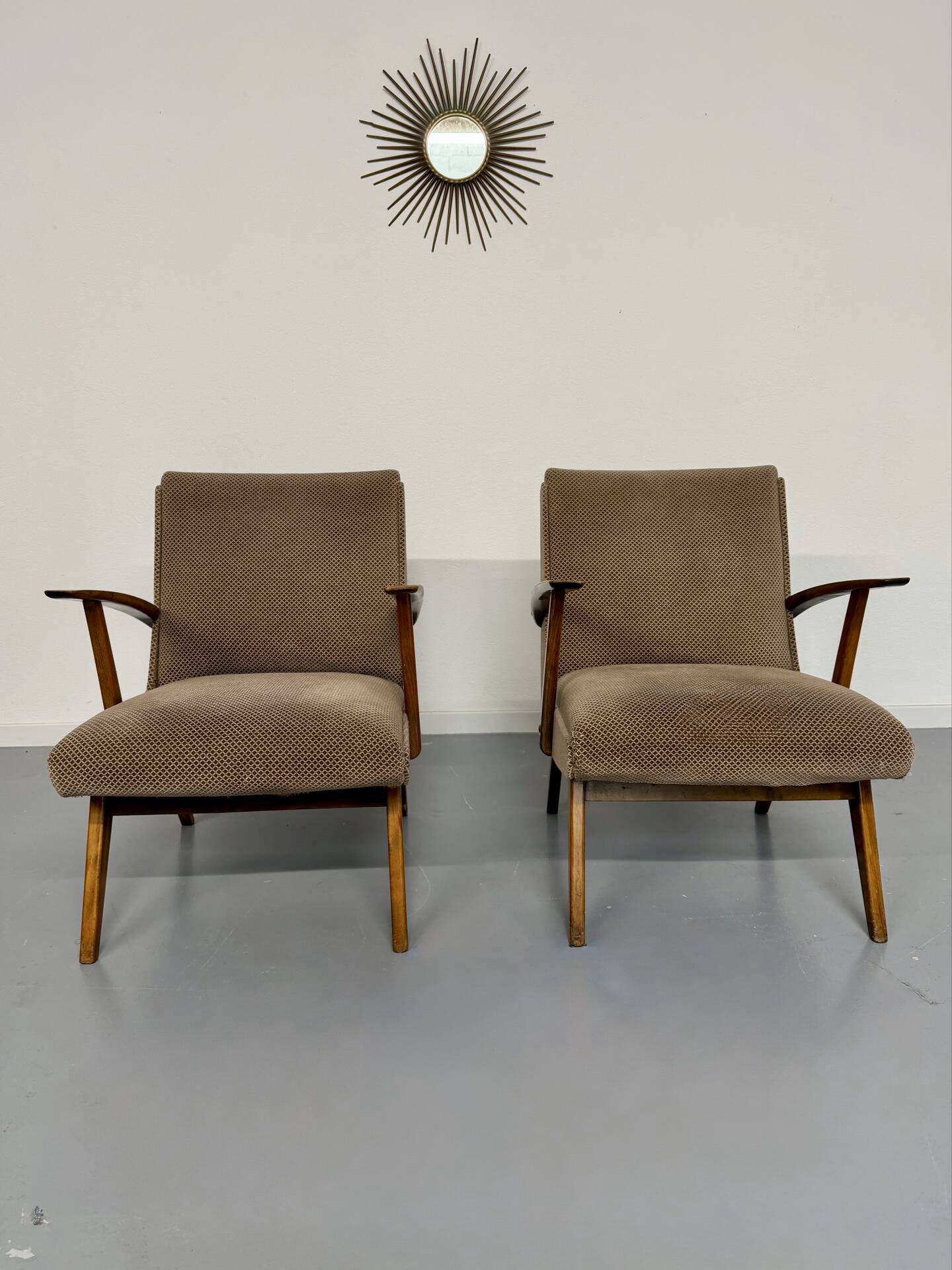 Set of 2 vintage wooden and fabric armchairs designed in the 1960s.