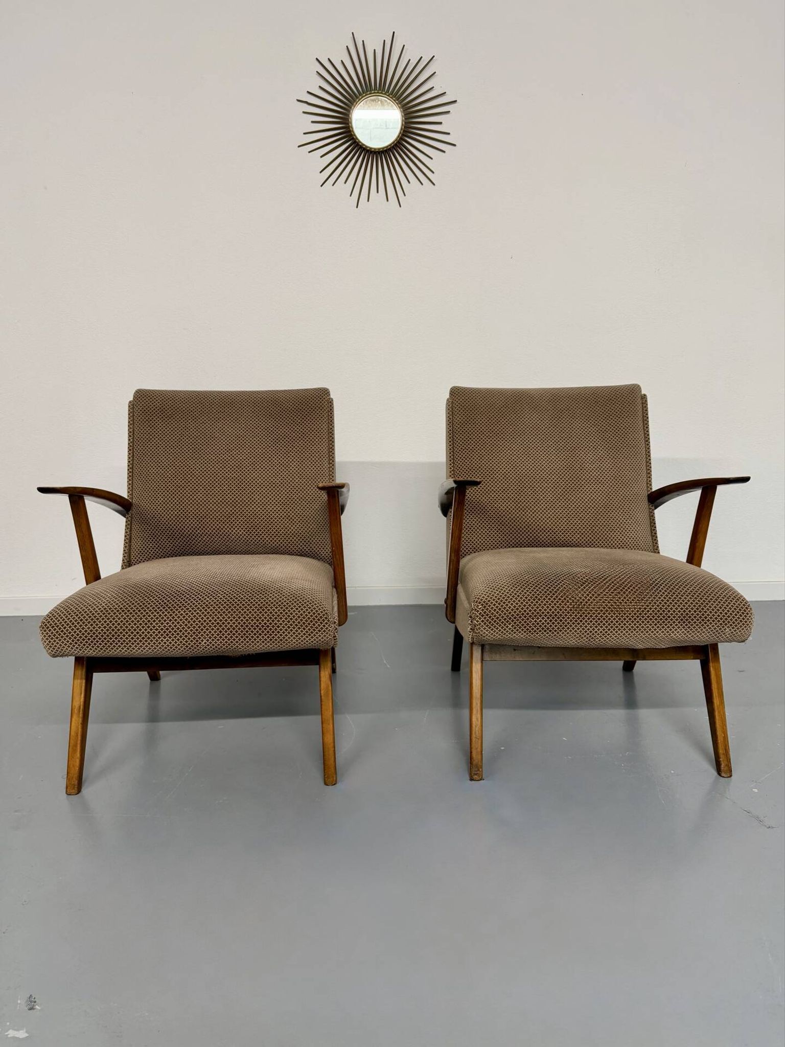 Set of 2 vintage wooden and fabric armchairs designed in the 1960s.
