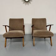 Set of 2 vintage wooden and fabric armchairs designed in the 1960s.