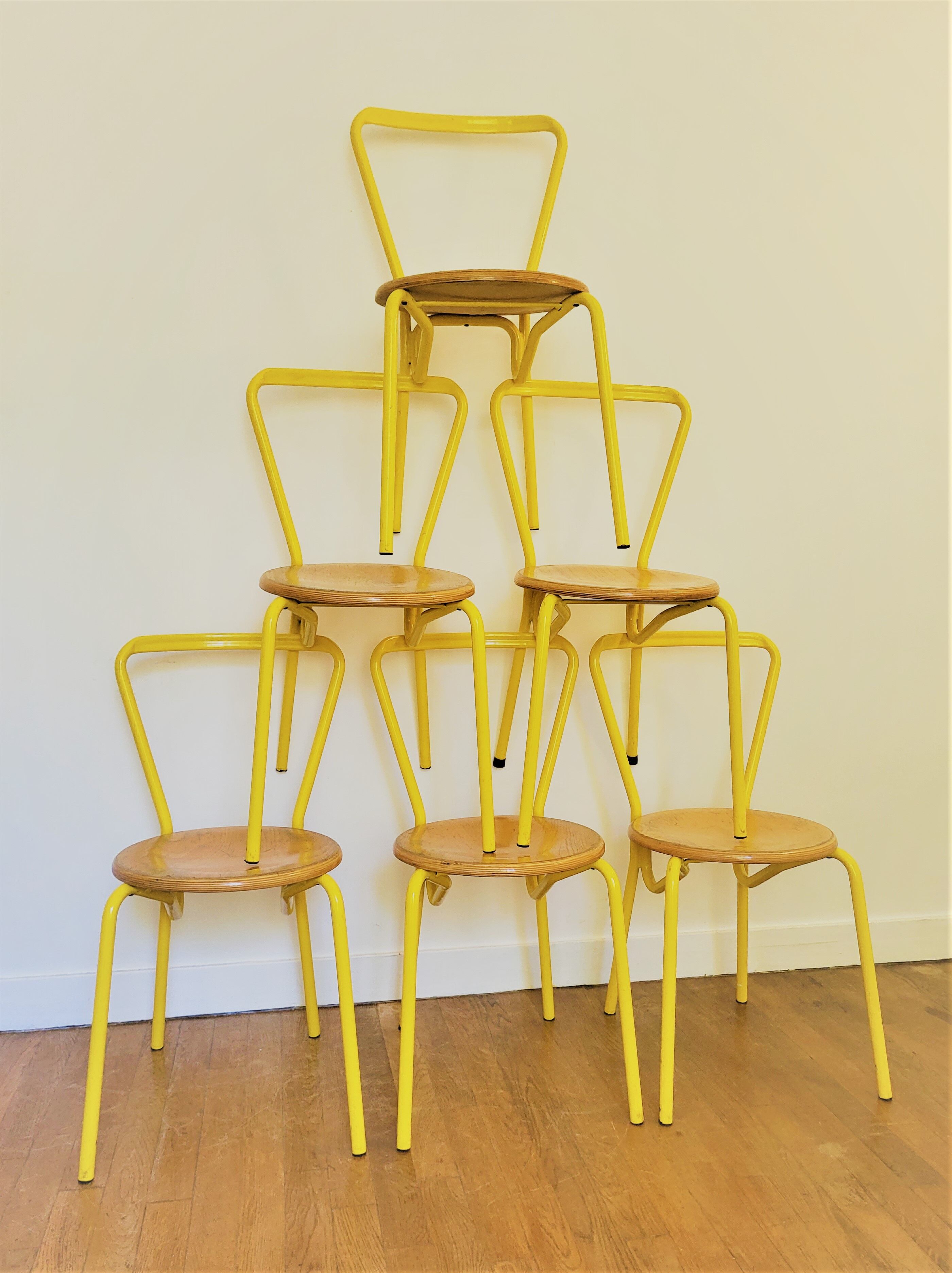 Vintage yellow school chairs from the 90s