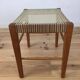Scandinavian stool from the 1960s with caning and wood.