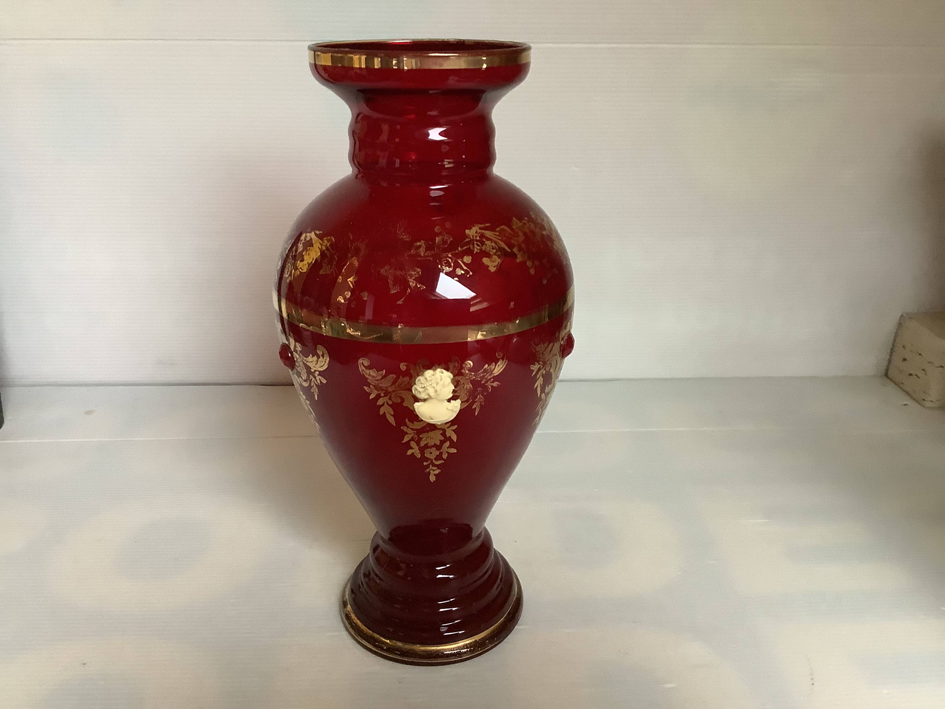 Cameo vase and red cabochons in burgundy glass