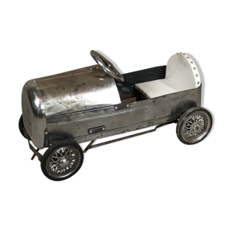 Old kid polished steel pedal car