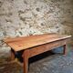 Old French rustic coffee table in cherry wood.