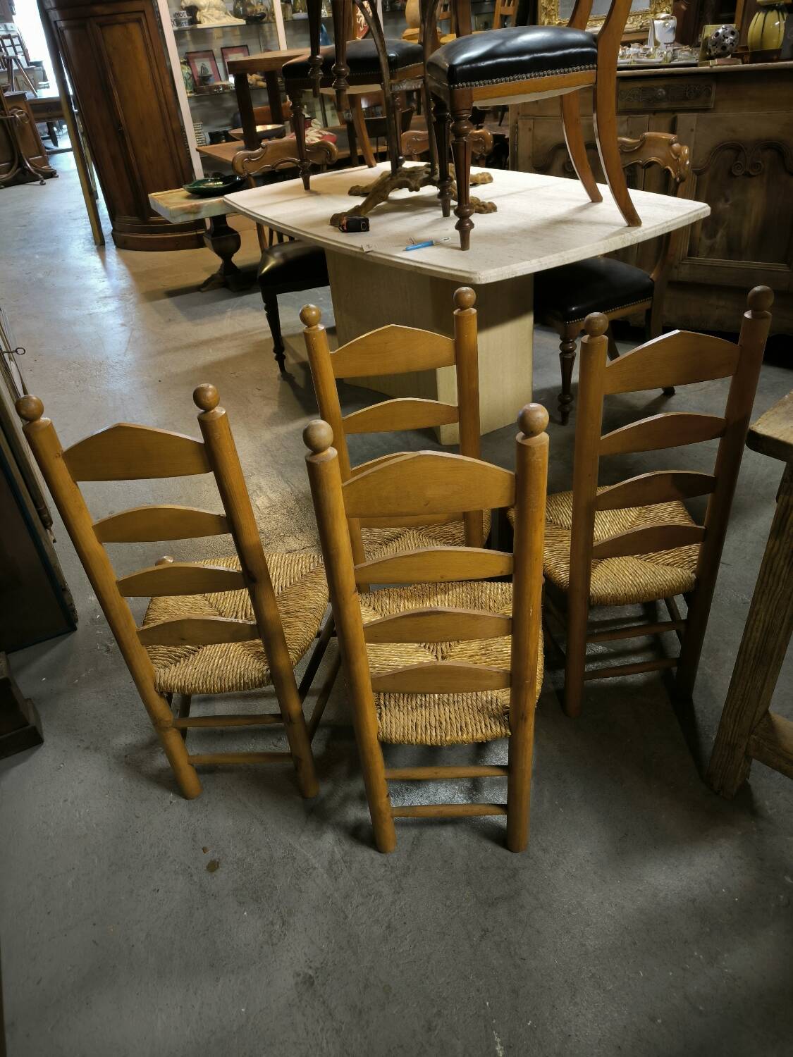 Set of 4 low straw-seated chairs circa 1940