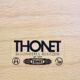 Thonet dining chairs stacked in chrome and beech