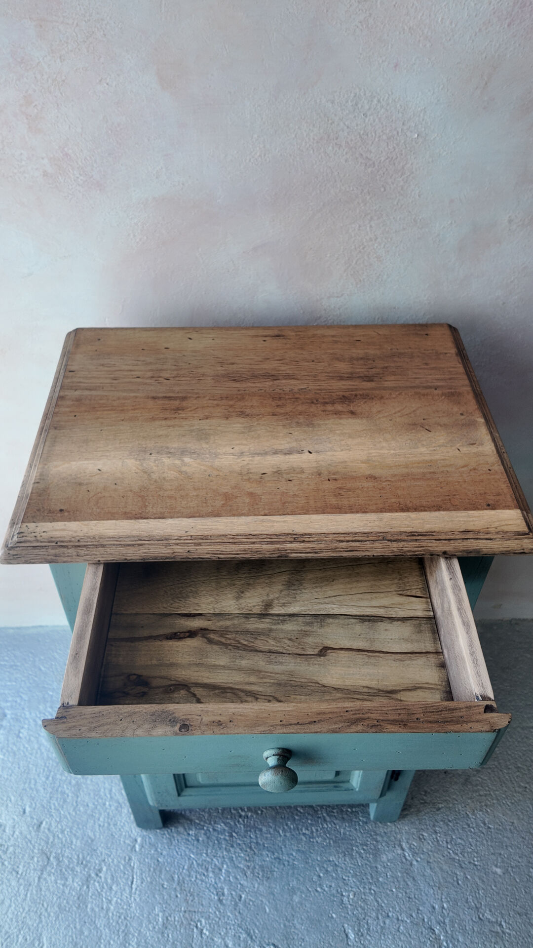 Small vintage side table in sage green patina and solid wood.