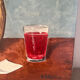 Still life with wine and painting, signed