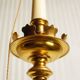 "Pique candle" double fire floor lamp in gilded bronze