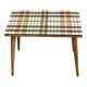 Small mosaic bedside table with tapered legs.