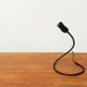 Lightworm minimalist table lamp by Walter Schnepel for Tecnolumen.