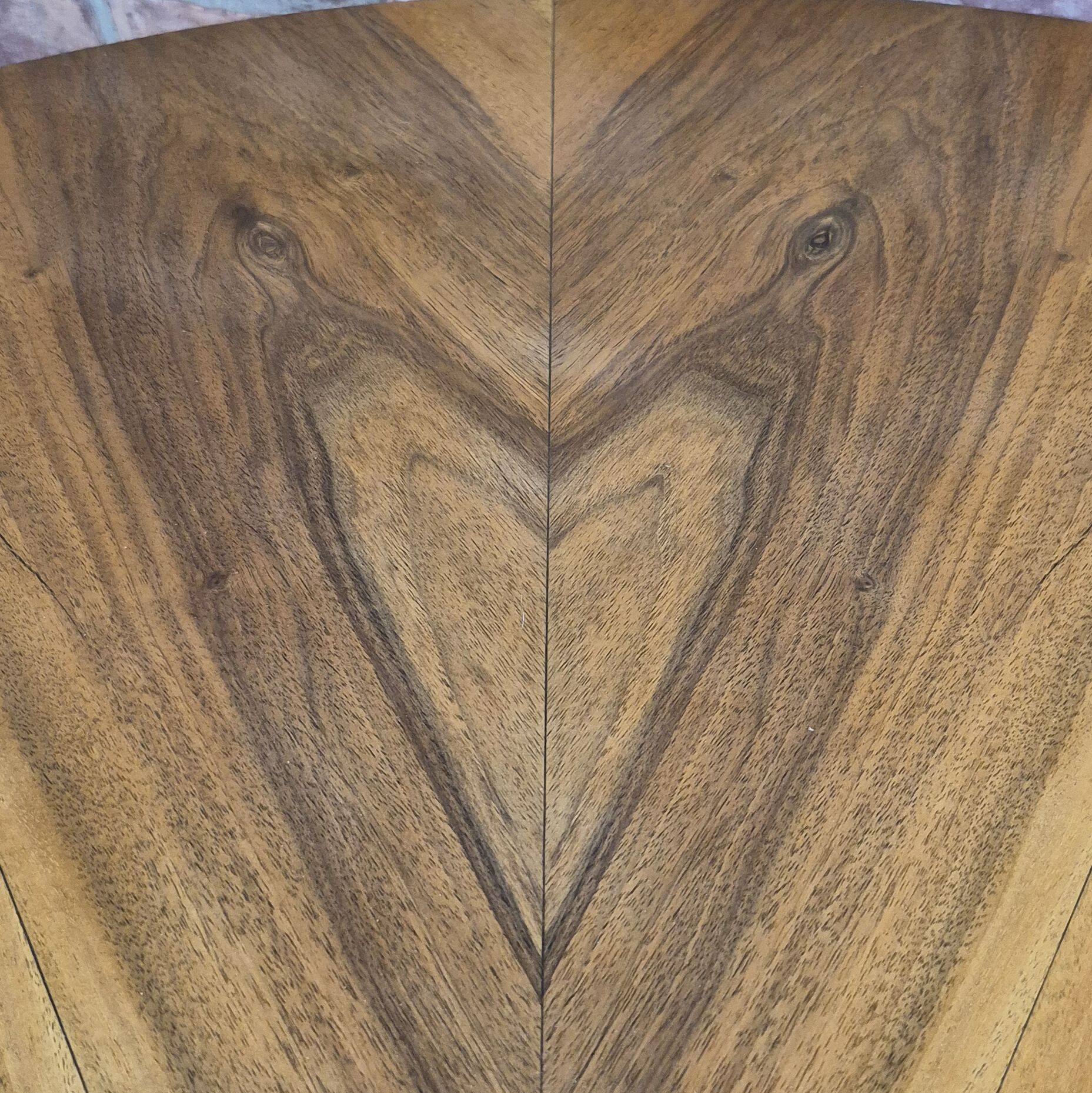 Walnut extendable round table after professional restoration. Art deco.