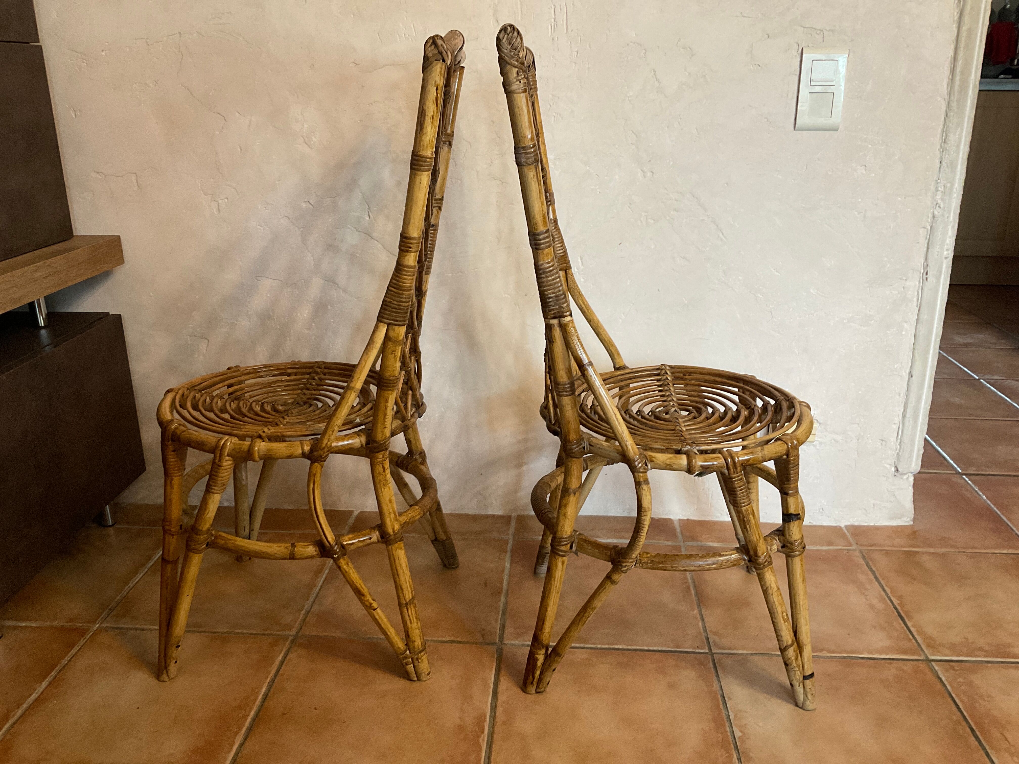 Pair of vintage rattan chairs Louis Sognot