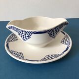 Porcelain gravy boat stamped Moulin des Loups & Hamage - Orchies. “Puppet” model