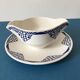 Porcelain gravy boat stamped Moulin des Loups & Hamage - Orchies. “Puppet” model