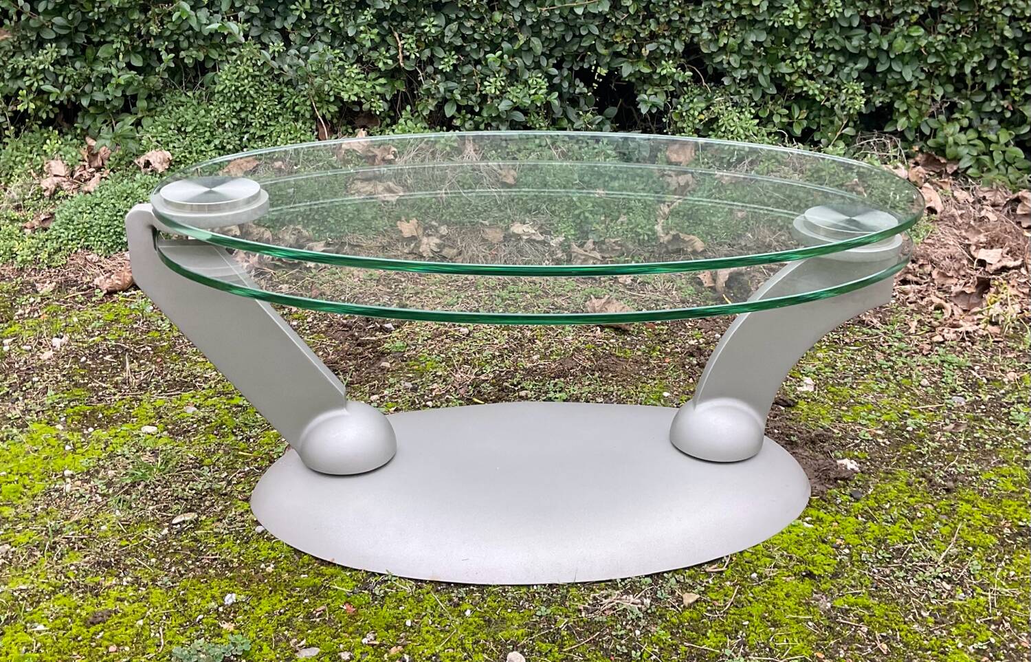 Naos designer coffee table in tempered glass and cast iron