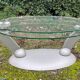 Design coffee table Naos in tempered glass and cast iron.