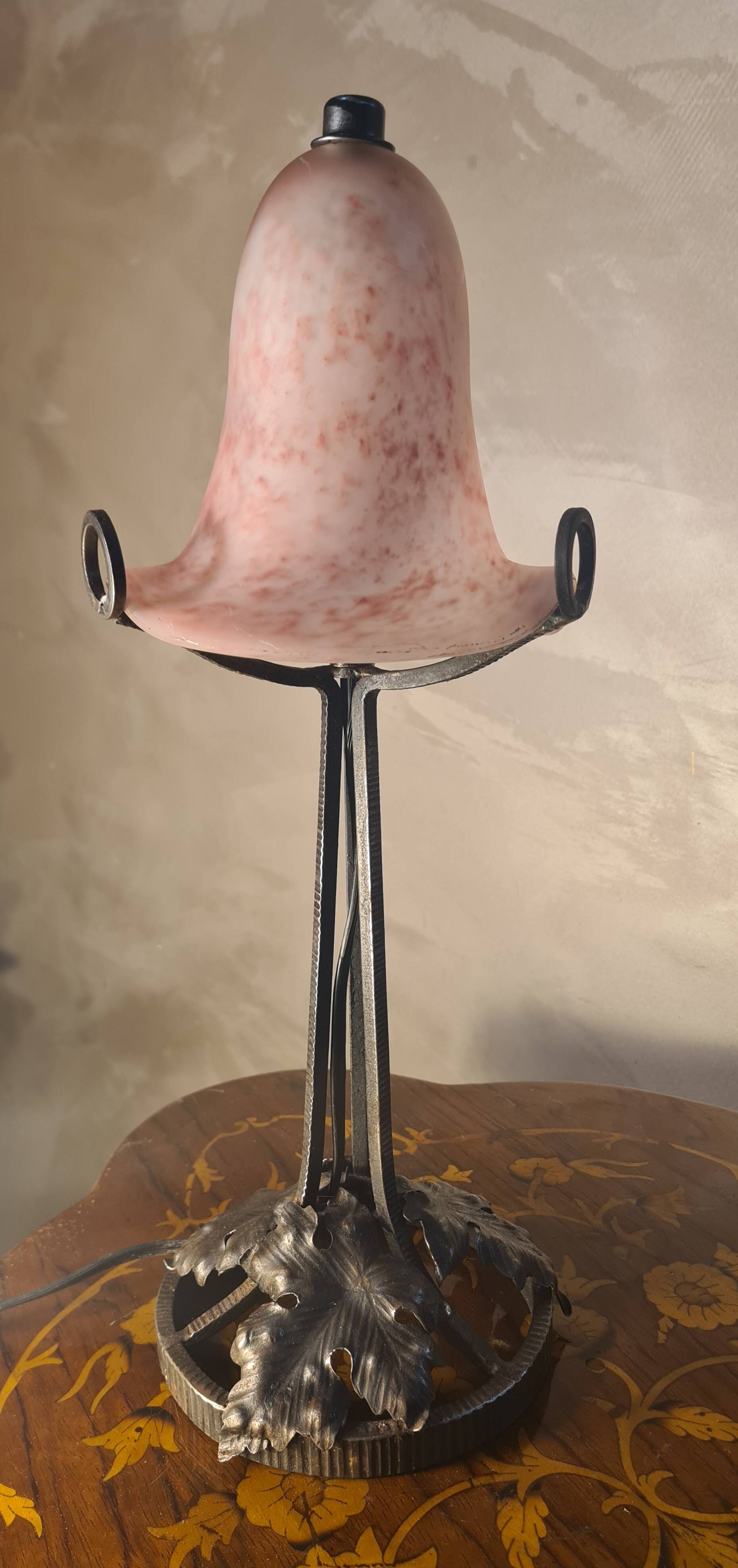 Antique wrought iron floor lamp, 1900, with a glass shade, 40x15.