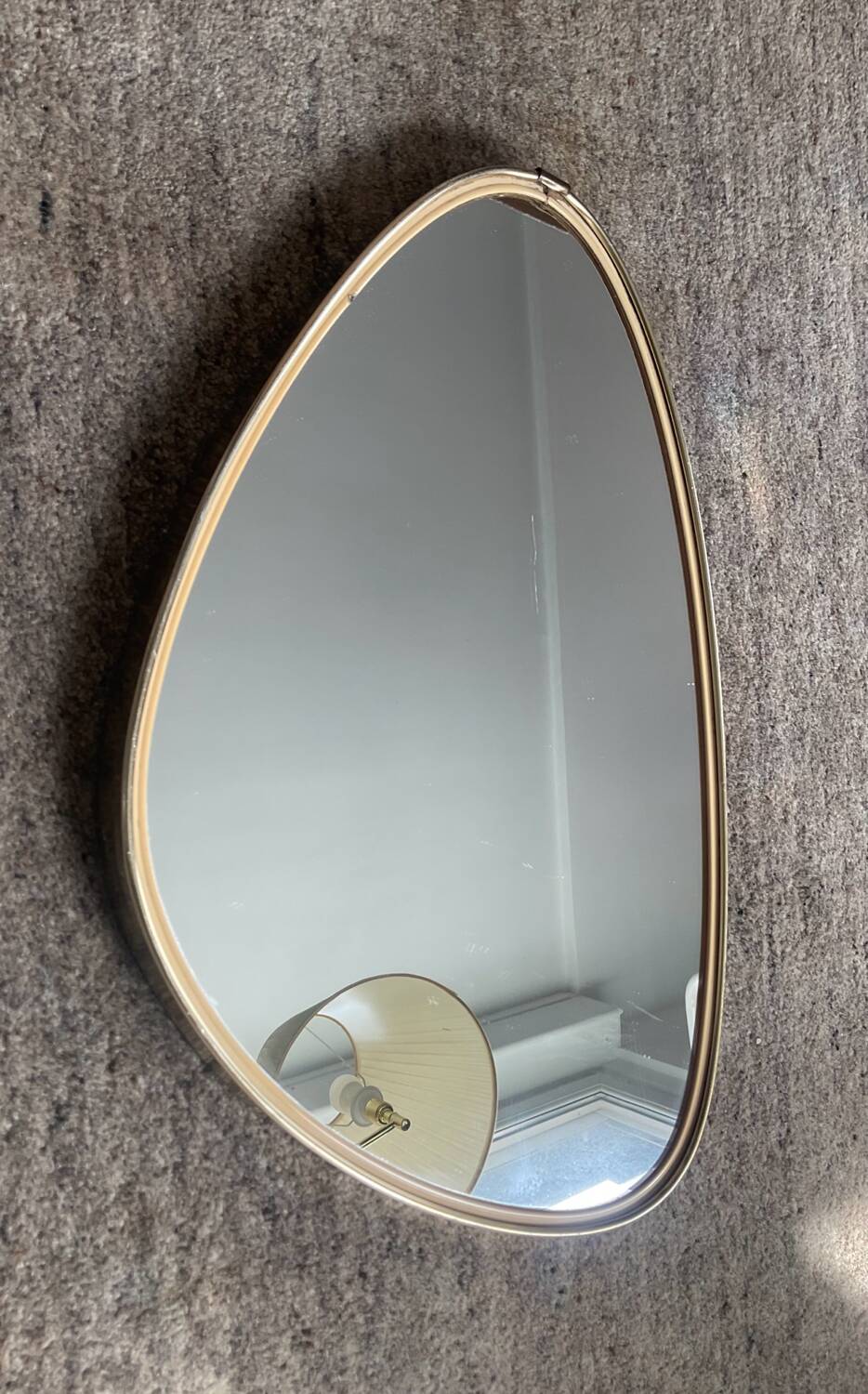 Asymmetrical free-form mirror from the 60s-70s.