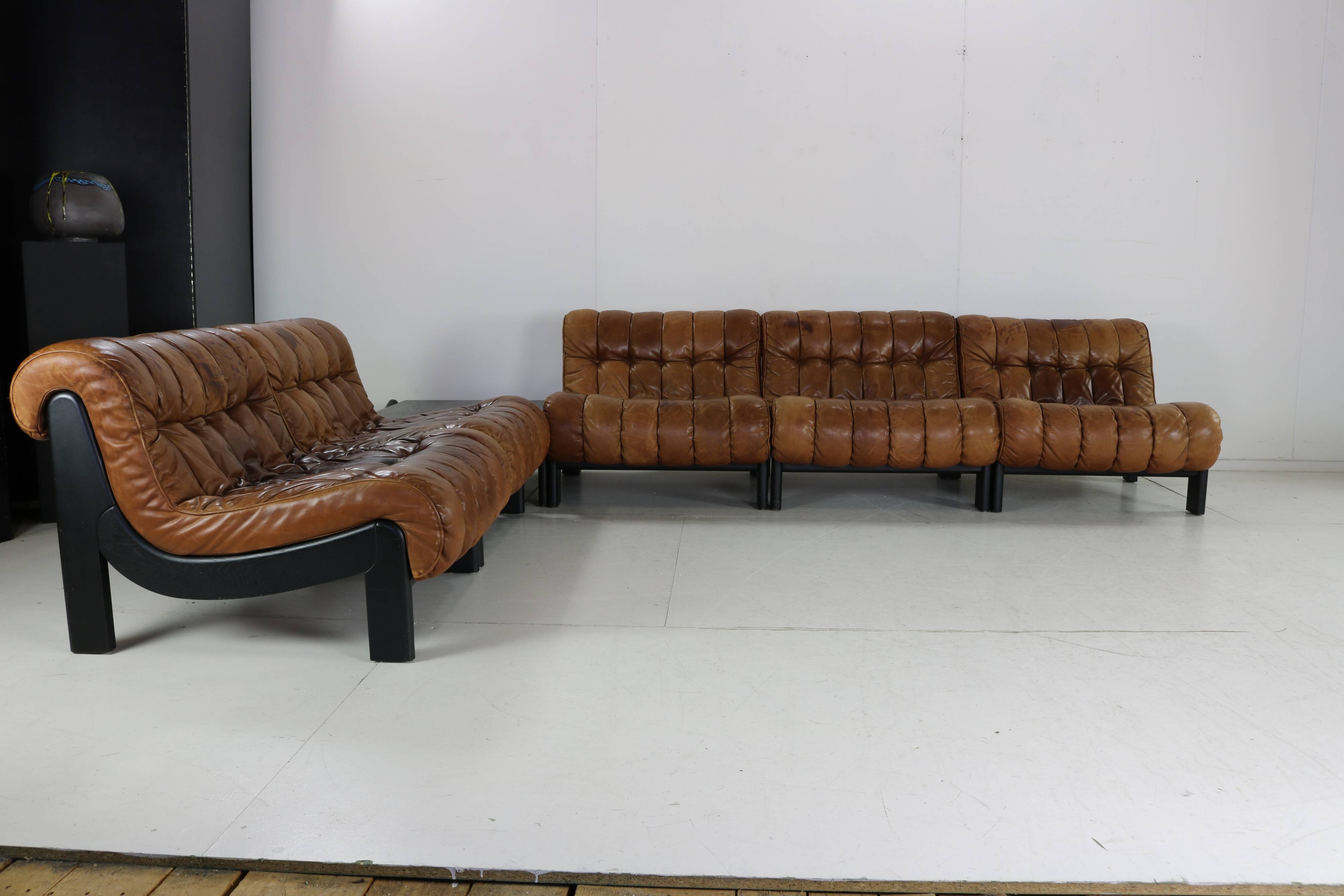 70s living room set in cognac brown leather with black wenge wood frame