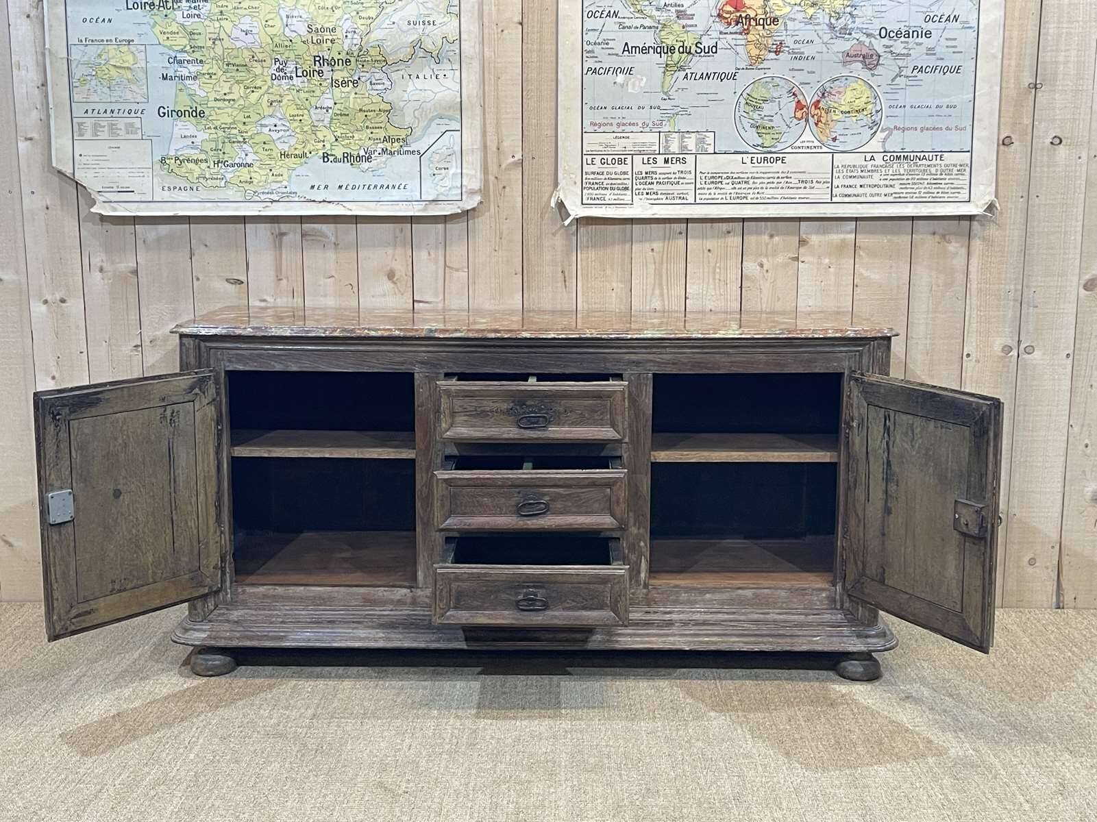 18th-century oak enfilade with a marble-effect painted top.