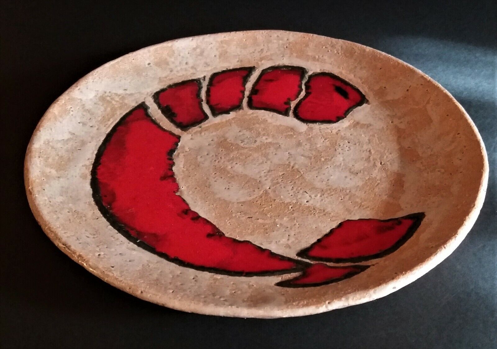 Vintage glazed terracotta ceramic plate signed Olivier