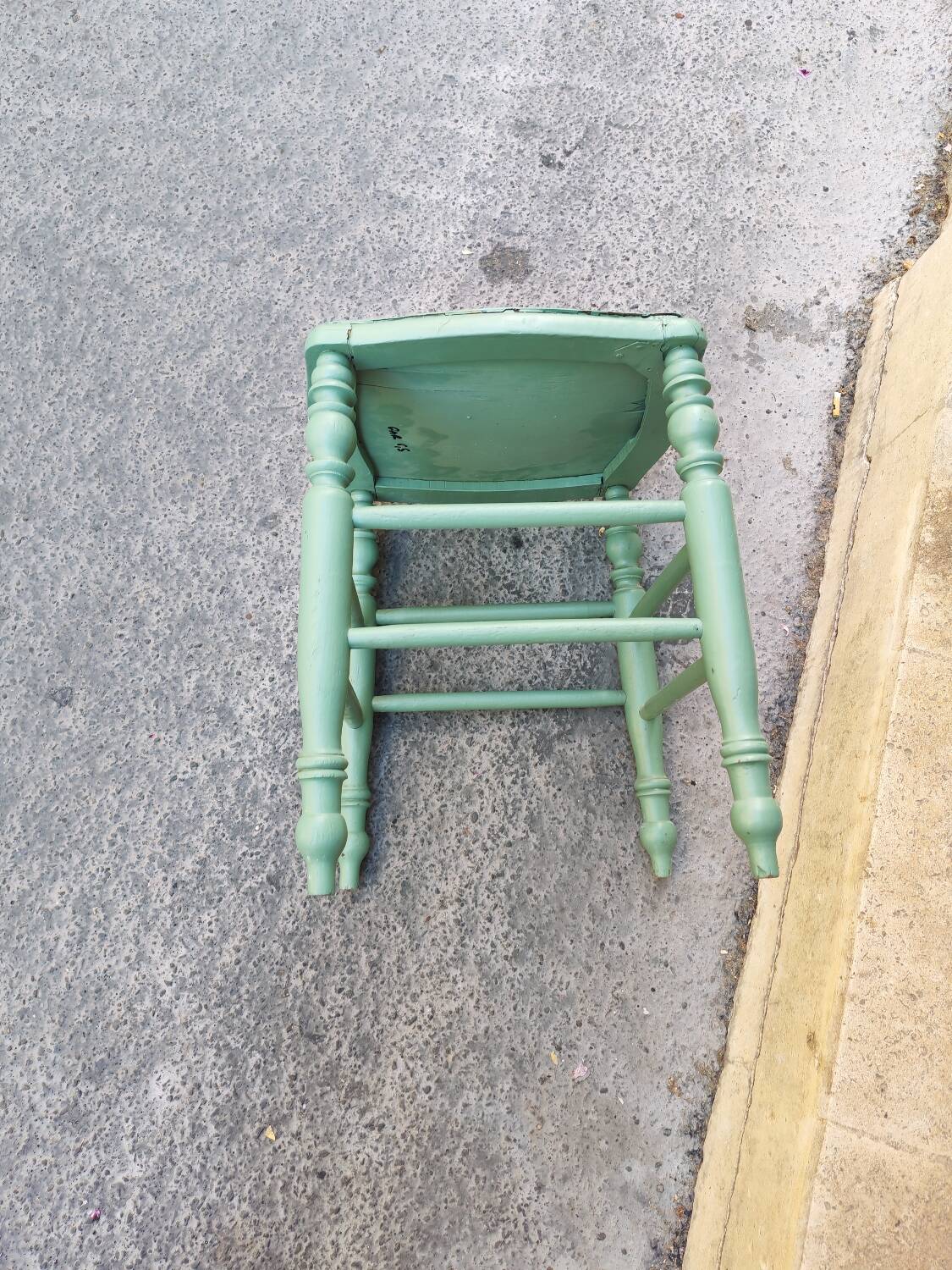 Antique green stool