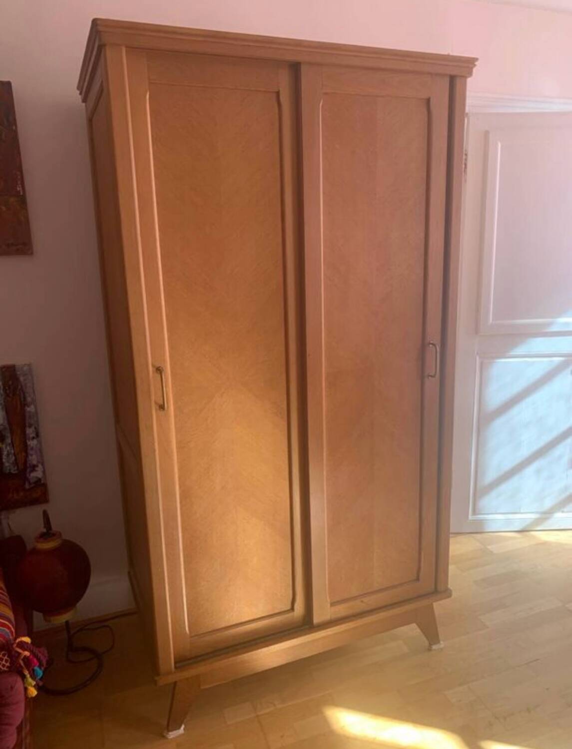 Scandinavian wardrobe with compass legs