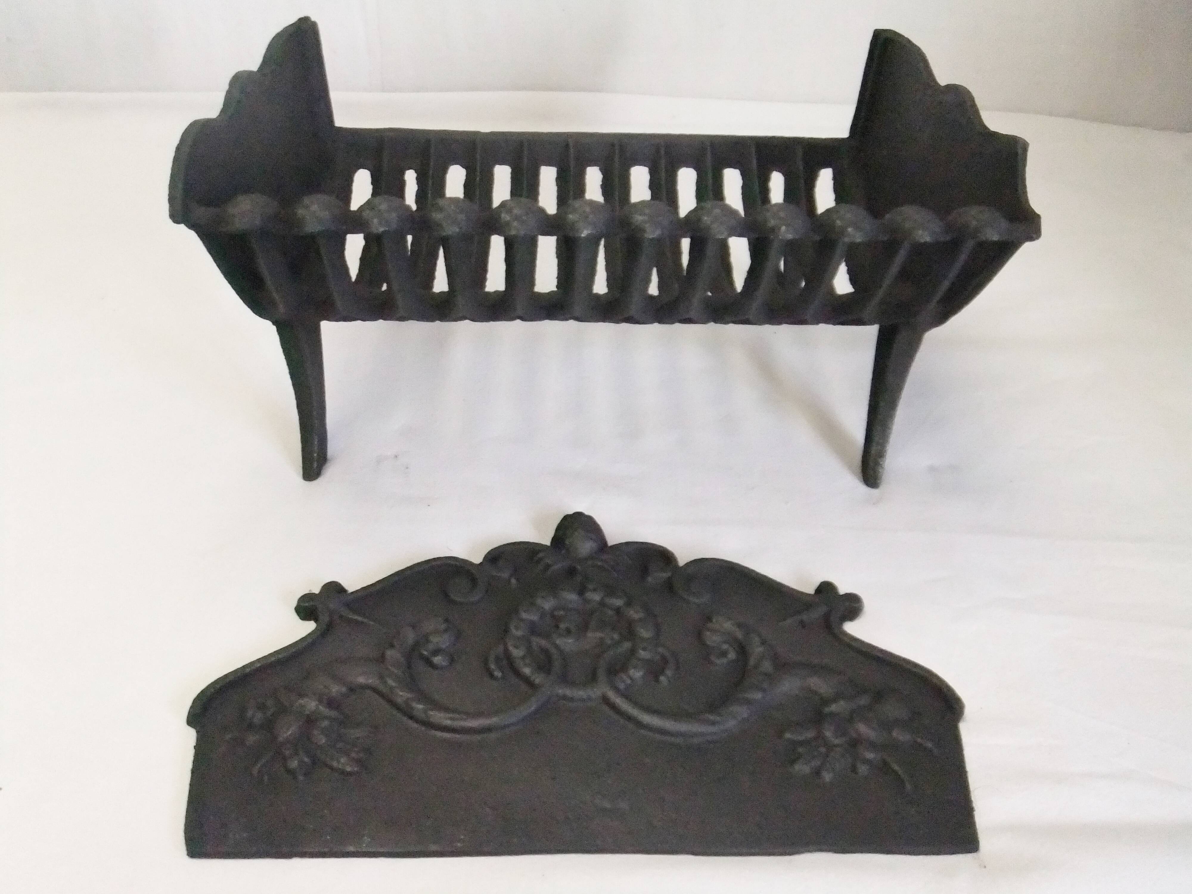 Old cast iron log holder andiron fireplace cornucopia pine cone