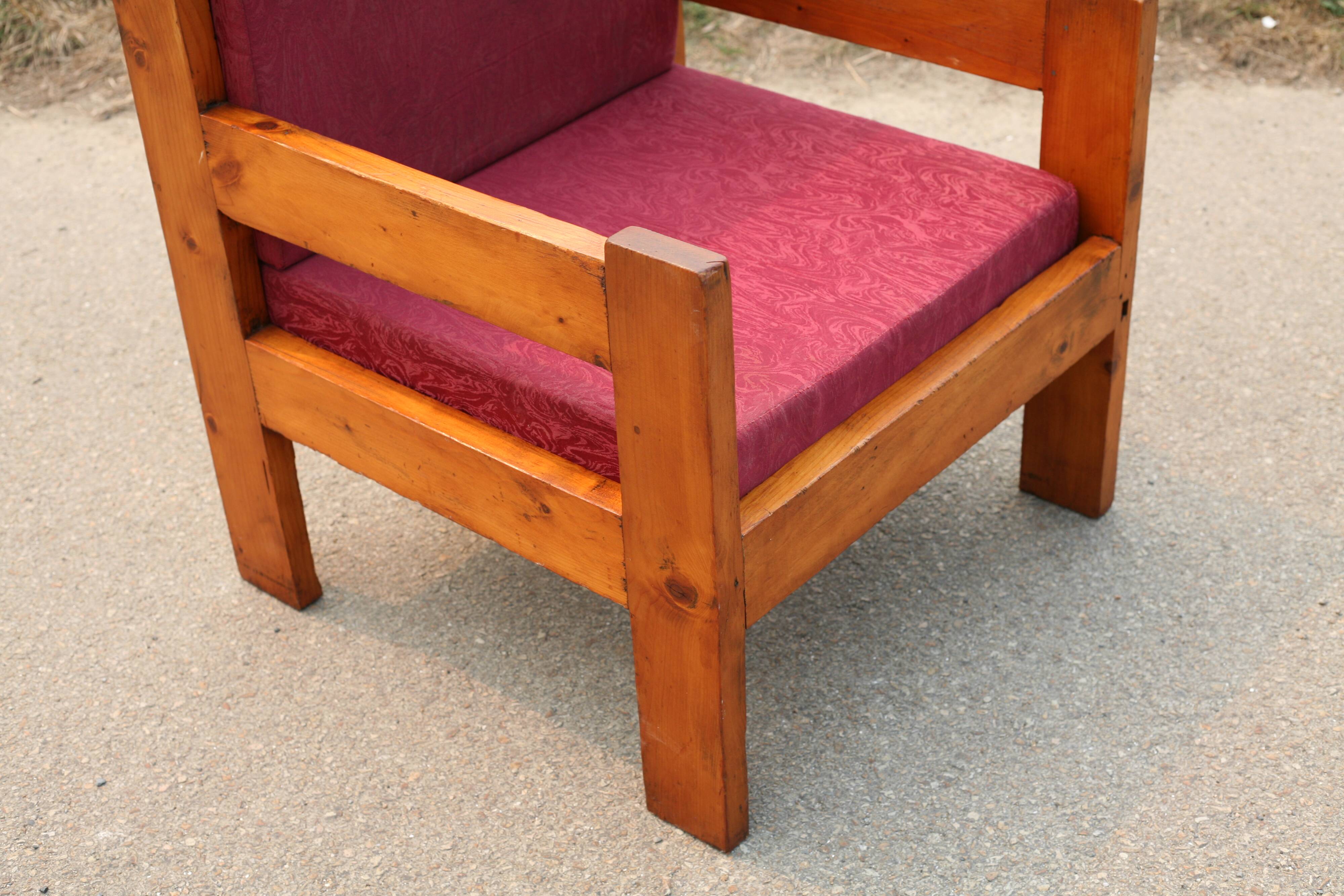 Pair of pine fireside chairs, France, 1960s, "raspberry" cushions