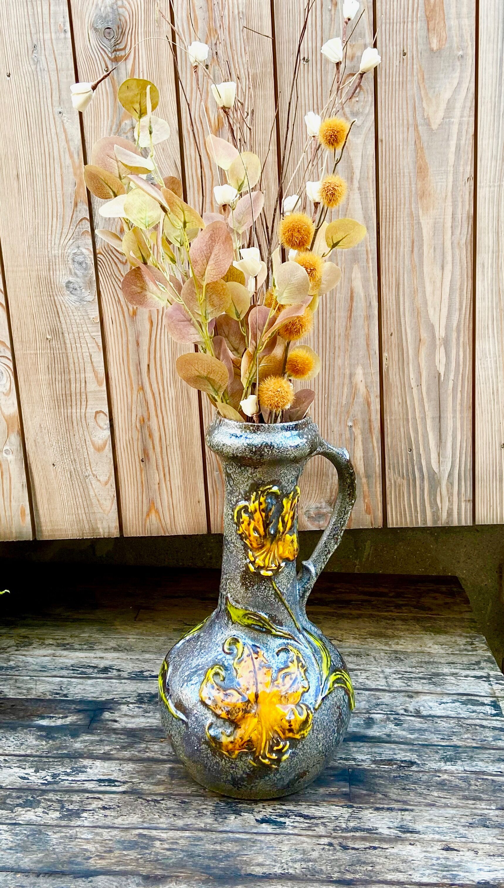 Vintage enamelled ceramic laying vase