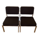 Pair of brown low chairs with chrome base