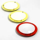Three round 1950s wall or ceiling lamps made of metal and plexiglass shades