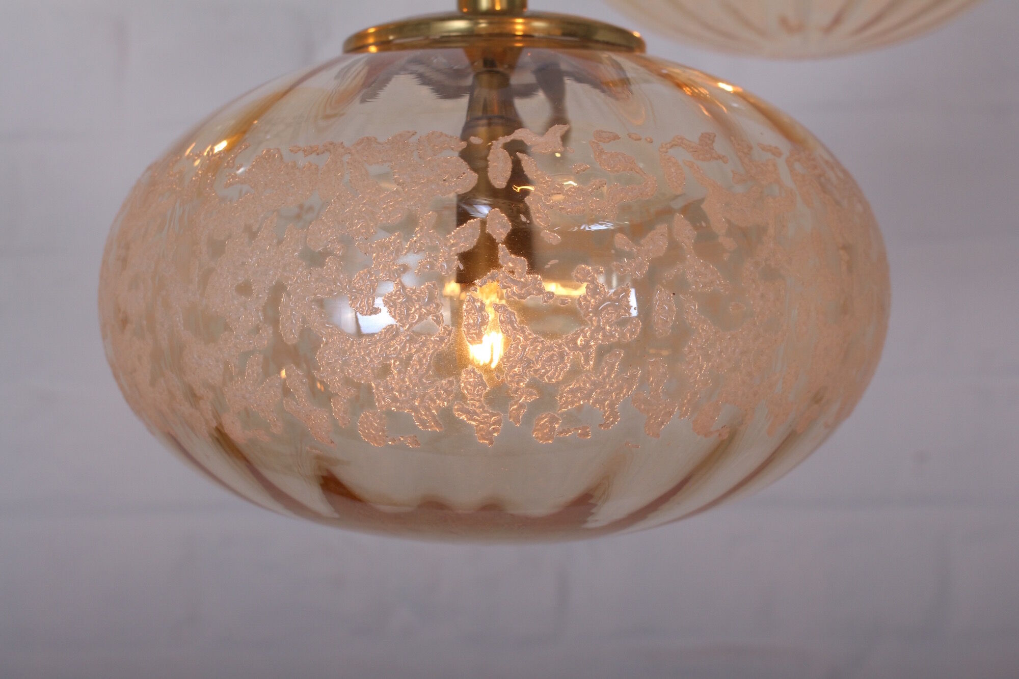 Cascade chandelier 4 globe in blown amber glass