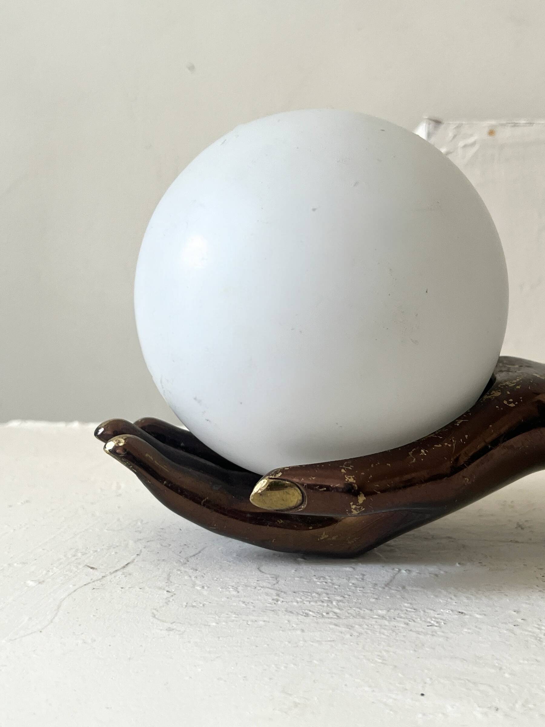 Vintage table lamp hand-crafted in bronze with an opaline globe, Maison Arlus 1970.