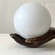 Vintage table lamp hand-crafted in bronze with an opaline globe, Maison Arlus 1970.