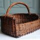 Handmade woven and dyed willow harvest basket.